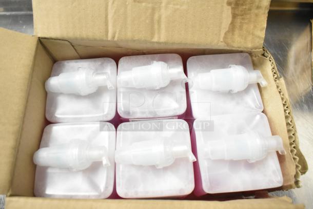 Boxes containing Purell hand sanitizer dispensers, Scott foam skin cleansers, and Aqua Sparkle detergent. Brand new condition.