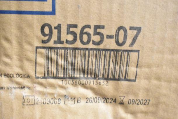 Close-up of a cardboard box with barcode, model number 91565-07, and expiration date 09/2027. Brand markings are faint.