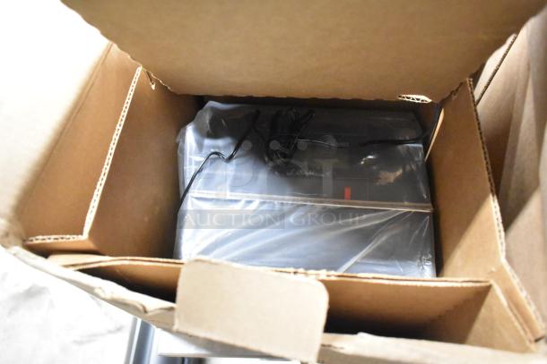 Brand new Pyramid 3700HD heavy duty time clock and document stamp in open box, wrapped in plastic, includes power cord.