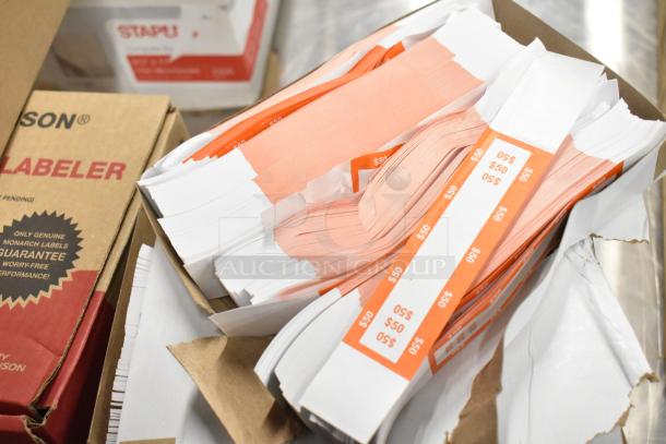 10 brand new boxes with Avery Dennison Monarch 1130 labeler labels, thermal receipt printer rolls, and nickel rolls.