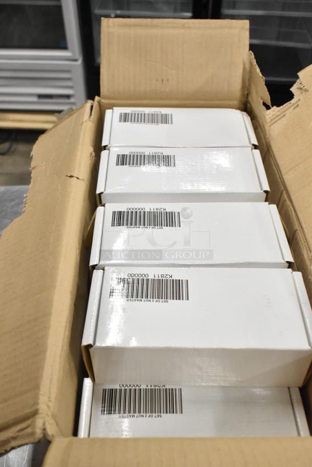 Box of Nut Master Mut Crackers, brand new. White packaging with barcodes visible.