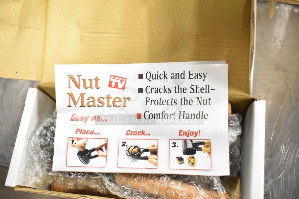 Box of Nut Master Mut Crackers, brand new. Features quick nut cracking, protective comfort handle. As Seen on TV label visible.