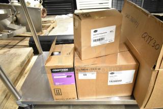 Three boxes of cleaning products: Diversey Oxivir Five 16 Concentrate, Spitfire RTU, and Coastwide Hepastat 256. Brand new, labeled.