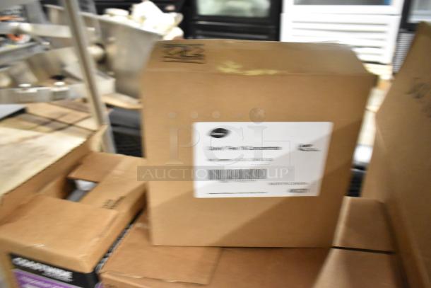 Three brand new boxes of Diversey and Coastwide cleaning products, including Oxivir, Spitfire RTU, and Hepastat 256.