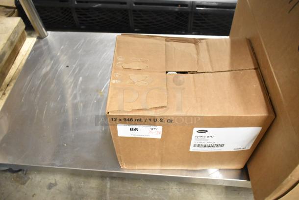 Box containing Diversey Spitfire RTU Power Cleaner, 12 x 946 mL bottles, labeled with auction stickers, brand new condition.