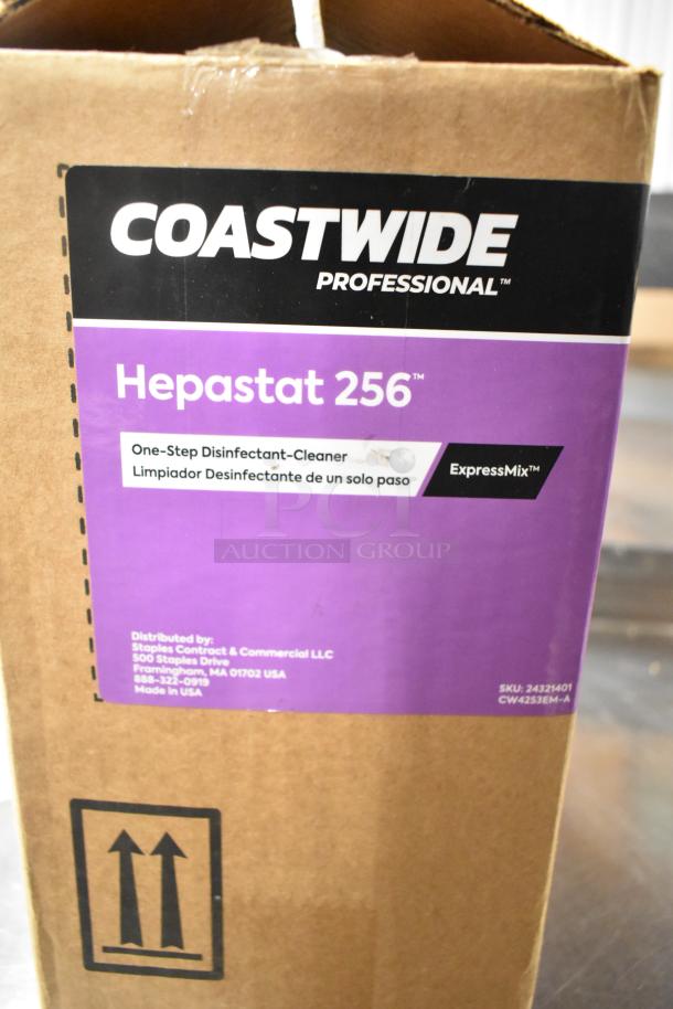Three unopened boxes containing Diversey Oxivir Five 16 Concentrate, Diversey Spitfire RTU Power Cleaner, and Coastwide Hepastat 256 Cleaner. Coastwide box labeled "Hepastat 256, One-Step Disinfectant-Cleaner."