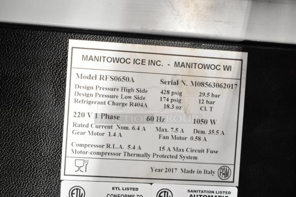 Brand new 2017 Manitowoc RFS0650A stainless steel flake ice machine, 682 lb capacity, 220V, 1 phase, with label details.