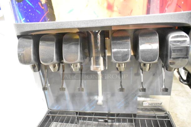 Servend SV150 metal commercial beverage machine, 6 flavor, with ice dispenser. Clean with visible branding. 115V, 1 Phase.