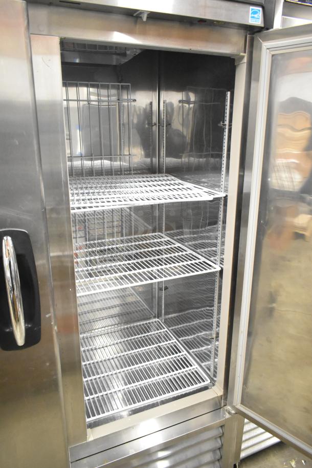 Kool Star KSR49-S stainless steel 2-door reach-in cooler with poly coated racks and commercial casters, 115V, 1 phase.
