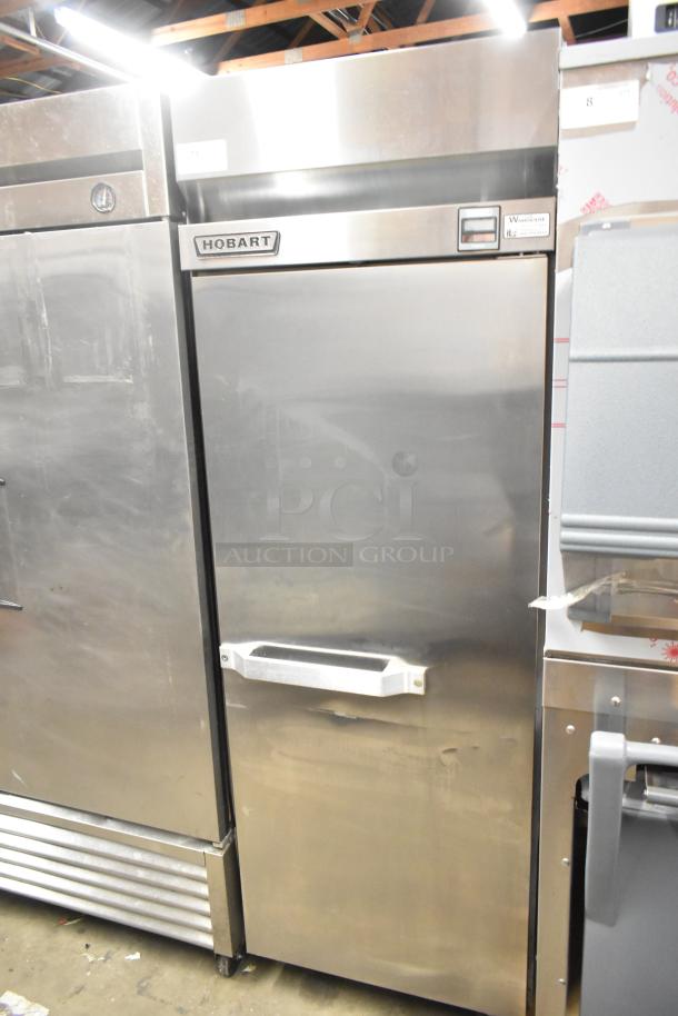 Hobart QF1 stainless steel commercial reach-in freezer, single door, poly-coated racks, on casters, 115V, 1 phase.