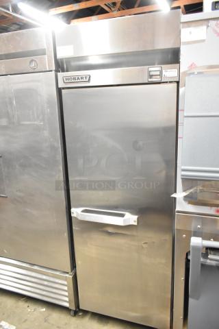 Hobart QF1 stainless steel commercial reach-in freezer, single door, poly-coated racks, on casters, 115V, 1 phase.