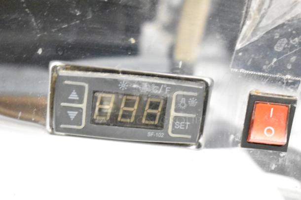 Marchia MDC161 deli display case control panel with digital temperature display and power switch. Model SF-102 visible.