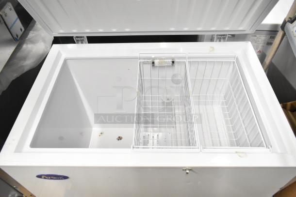 Atosa MWF9010GR metal chest freezer with hinge lid, shown open. Features internal wire basket, 115 volts, 1 phase. Clean condition.