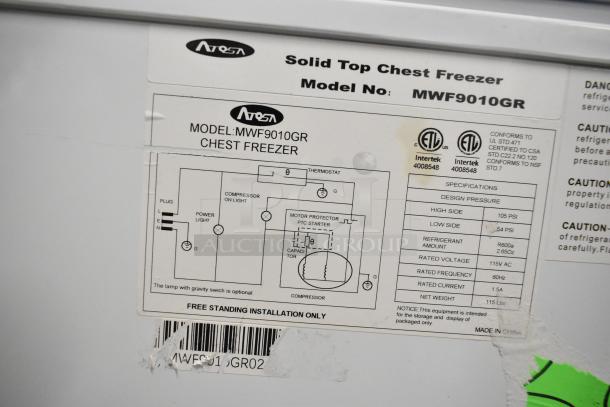 Atosa MWF9010GR Metal Chest Freezer with hinge lid. Features 115 volts, 1 phase power. Includes specifications and wiring diagram on label.