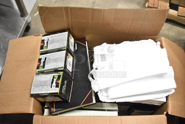 Lot of 25 items in a box: notebooks, copy paper reams, and Lexmark printer cartridges. Mixed office supplies.