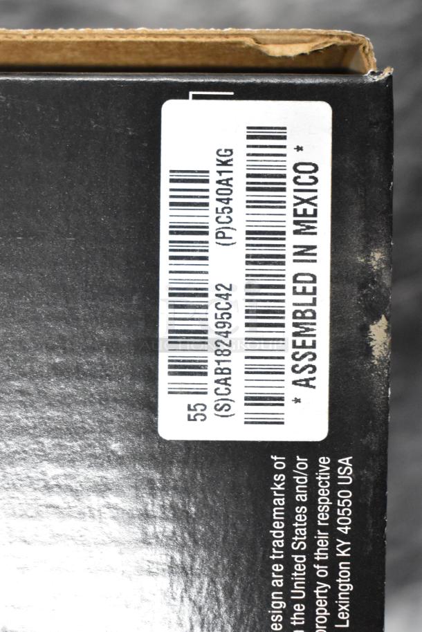 Lot with approx. 25 items, including notebooks, copy paper reams, and a Lexmark printer cartridge. Box marked "Assembled in Mexico."