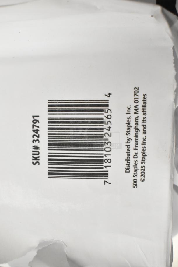 Barcode on packaging marked "SKU# 324791", distributed by Staples, Inc., showing possible contents of office supplies.