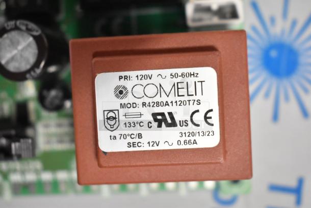 Comelit transformer, model R4280A1120T7S. Voltage: 120V primary, 12V secondary, 0.66A. CE and RU certified.
