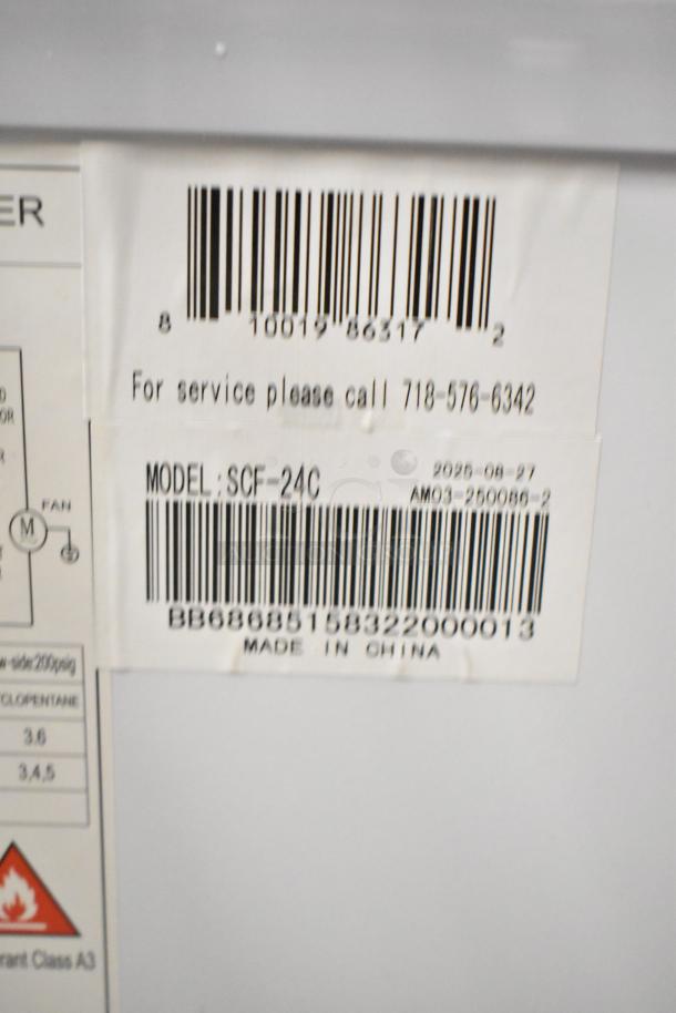 KoolMore SCF-24C Chest Freezer, 24 cu ft, 115V, new with scratches, model label shown. Made in China. Call 718-576-6342 for service.