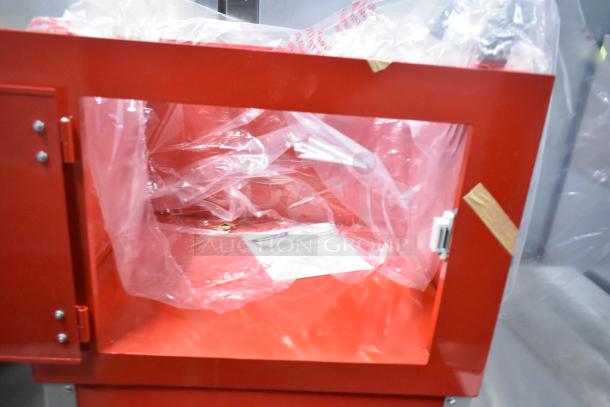 Brand new metal commercial popcorn machine and merchandising cart, red exterior. Scratch and dent condition, packaging intact.