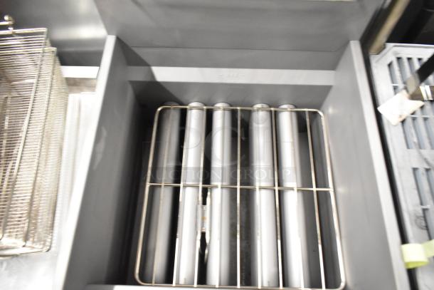 Brand new Mainstreet 541FF100L stainless steel commercial floor fryer, 70-100 lb., liquid propane, 150,000 BTU, includes 2 metal fry baskets.