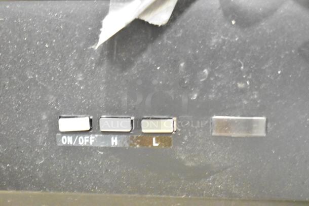 Boltic 6873518LYB air curtain control panel with on/off and H/L settings, slight wear visible, remote and magnetic switch included.