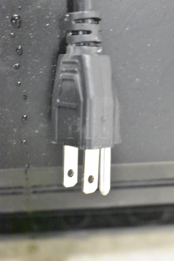 Boltic 6873518LYB 72" black aluminum air curtain plug. Remote magnetic door switch included. Scratch and dent condition.