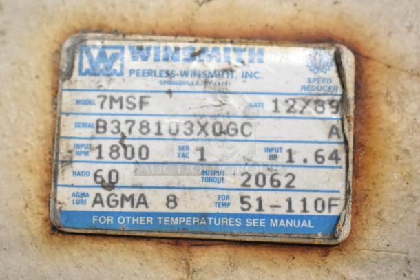 "Peerless-Winsmith label on rusty surface, Model 7MSF, Serial B378103X06C, RPM 1800, HP 1.64, dated 12/89."
