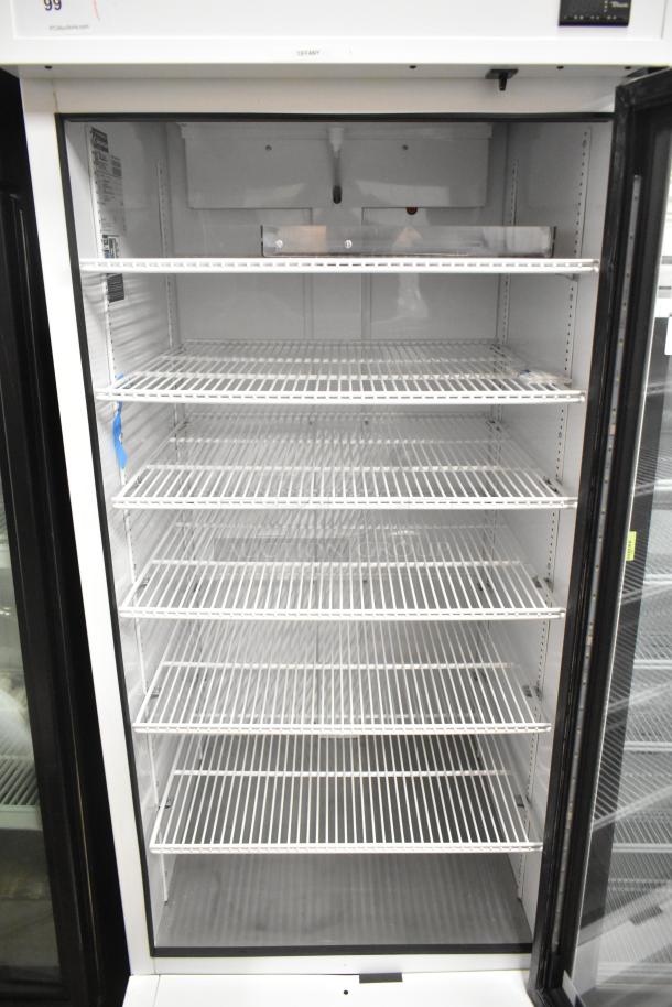 2020 True TSCI-600R-G-PH Commercial Cooler, single door, glass-front, with poly-coated racks. 115V, excellent condition.