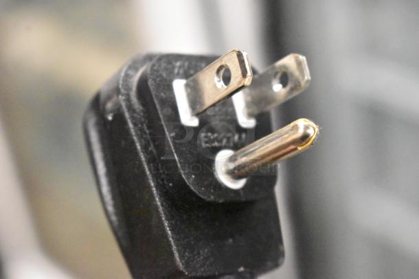 Close-up of a power plug for the 2019 Habco SE18 cooler. Visible markings: "E19411."