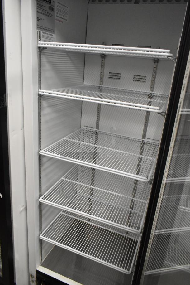 2019 Habco SE18 single door cooler, metal body, poly-coated racks, 115V, 1 phase, excellent condition, clear labels inside.