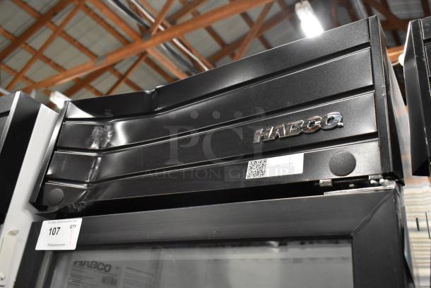 2019 Habco SE18 metal single-door cooler with poly-coated racks, 115 volts, 1 phase. Model label and auction tag visible.