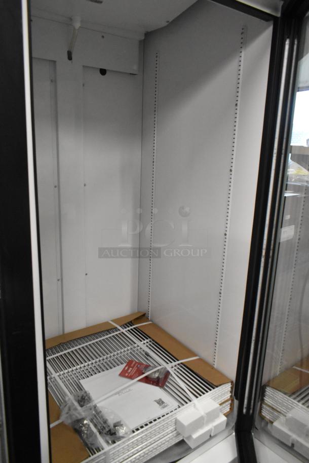 Brand new True TSCI-600R-G-PH metal commercial cooler, scratch and dent. Includes poly coated racks, 115V, 1 phase.