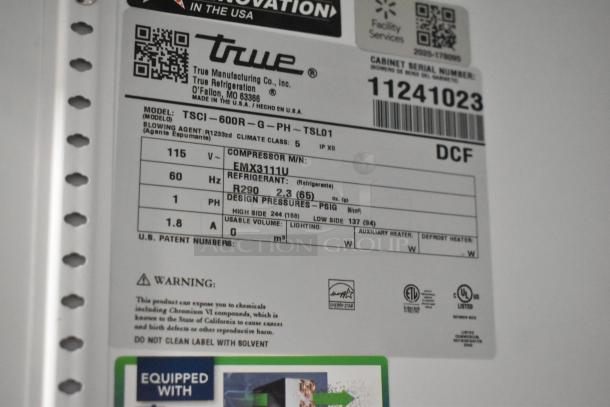 Label on True TSCI-600R-G-PH cooler showing model details, voltage (115V), phase (1), refrigerant (R290), and safety warnings.
