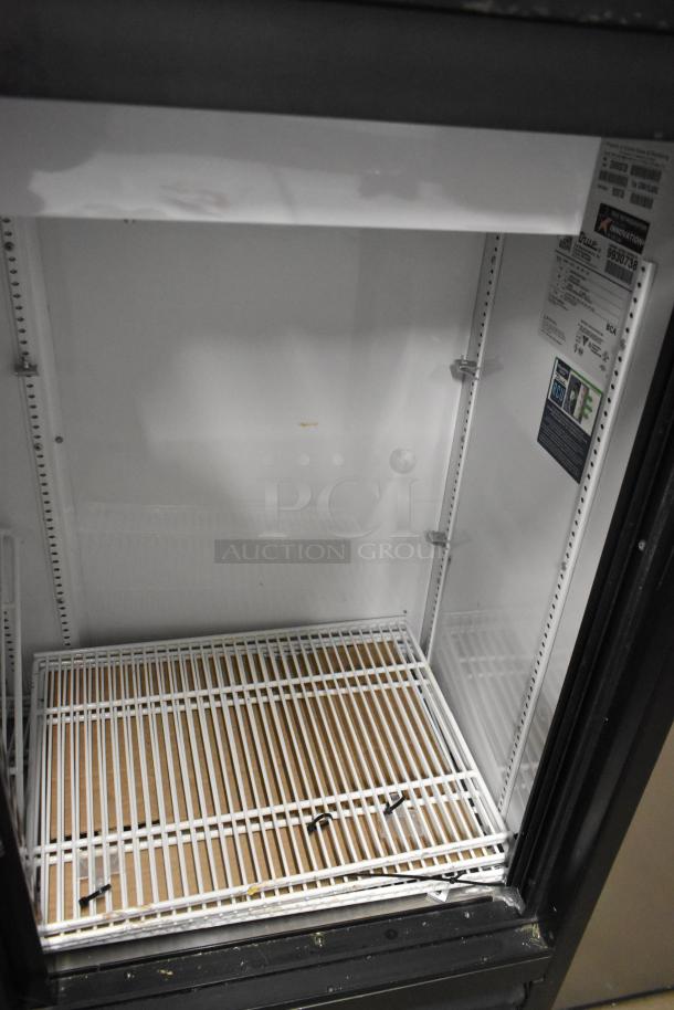 2020 True GDM-41SL-48-HC-LD commercial 2-door cooler with poly-coated racks, 115 volts, clean interior, labels visible.