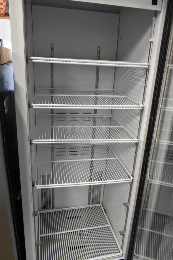 2019 Habco SE18 metal reach-in cooler with poly-coated racks, single glass door, 115V, 1-phase.