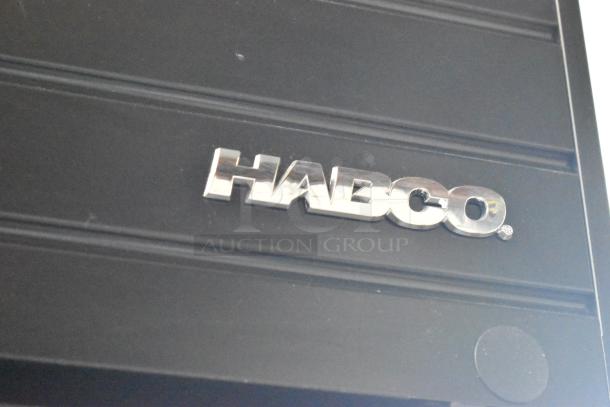 2019 Habco SE18 metal commercial single door cooler featuring poly-coated racks, 115V, 1 phase; visible Habco logo.