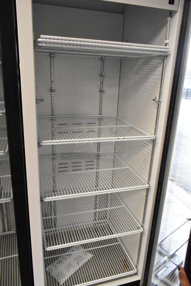 2019 Habco SE18 single door cooler with poly coated racks, metal construction, 115V, 1 phase, in excellent condition.