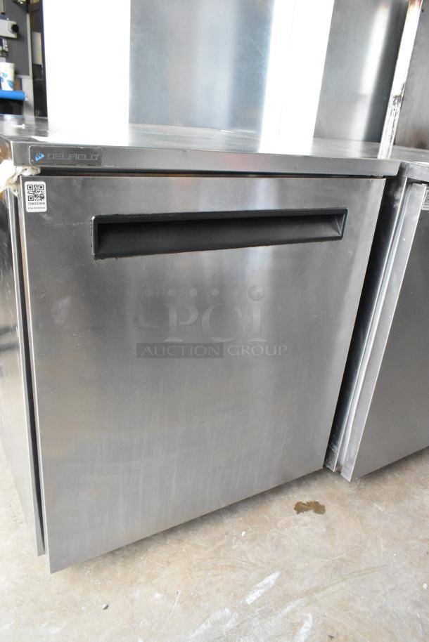 2020 Delfield 406P-STAR2 single door undercounter cooler, stainless steel, on casters, 115V, 1 phase. Visible Delfield logo.