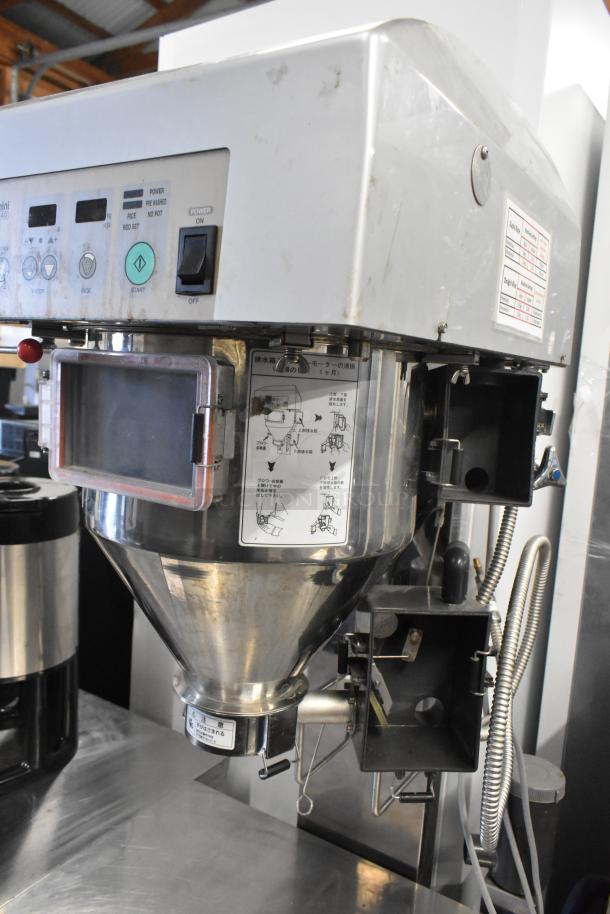 Ricemini RM-401A Metal Commercial Rice Washing Machine, floor style, 100V, 1 phase, visible controls and instructions, good condition.