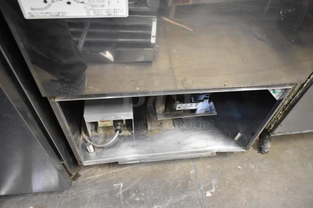 Ricemini RM-401A metal commercial rice washing machine, 100 volts, 1 phase. Visible wiring and components; used condition.