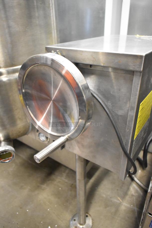 Cleveland KGL-40-T stainless steel 40-gallon steam kettle, floor style, natural gas, 140,000 BTU, control panel visible.