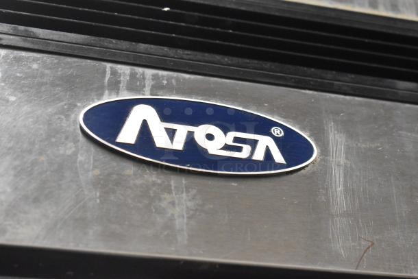 Atosa MCF8707 Stainless Steel Reach-In Cooler, 2 doors, poly-coated racks, commercial casters, slight surface wear.