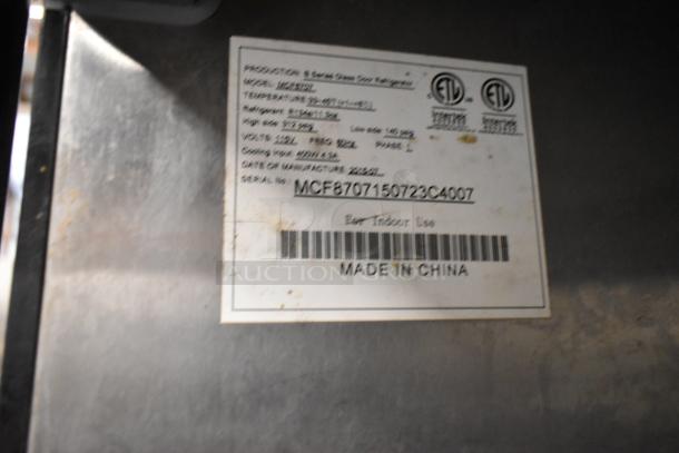 Atosa MCF8707 commercial cooler tag, stainless steel, 2 doors, with poly-coated racks and casters, Made in China label.