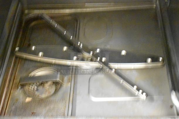 2018 Hobart LXER dishwasher interior, stainless steel, shows spray arms and filters. Used condition. 120/208-240V, 1 Phase.