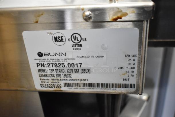 Bunn 1SH STAND stainless steel server stand, 120V, 1-phase. Label shows model and electrical specs. Commercial-grade.