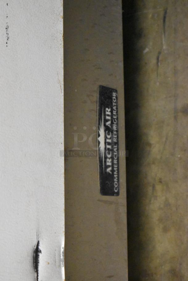 Arctic Air R22CWF6 single door reach-in cooler with commercial casters, 115V, metal construction, visible branding.