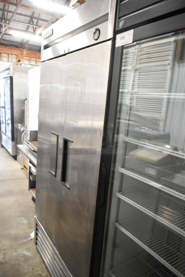 2017 True T-35 stainless steel commercial 2-door reach-in cooler, 115 volts, 1 phase, with minor surface marks.