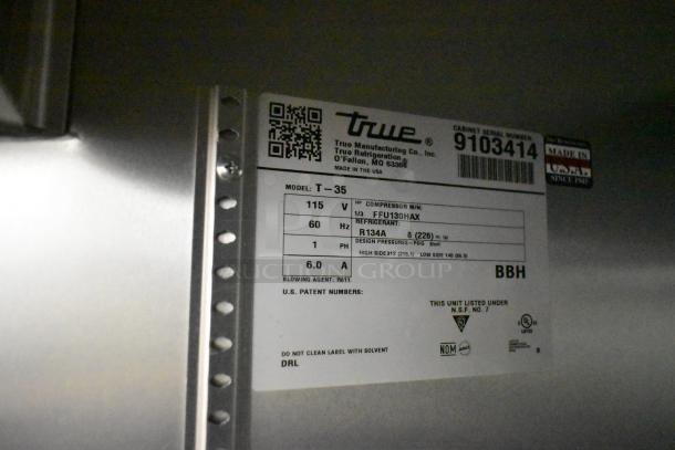 2017 True T-35 stainless steel commercial 2-door reach-in cooler label showing model, voltage, and specs.