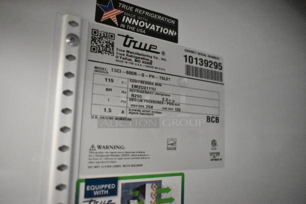 Label of True TSCI-600R-G-PH cooler showing model, voltage, refrigerant type, and design pressure details.